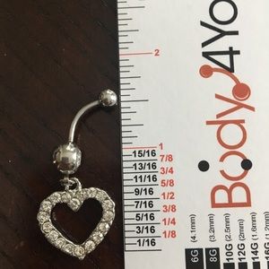 Clear crystal dangling ❤️ belly ring. Never worn